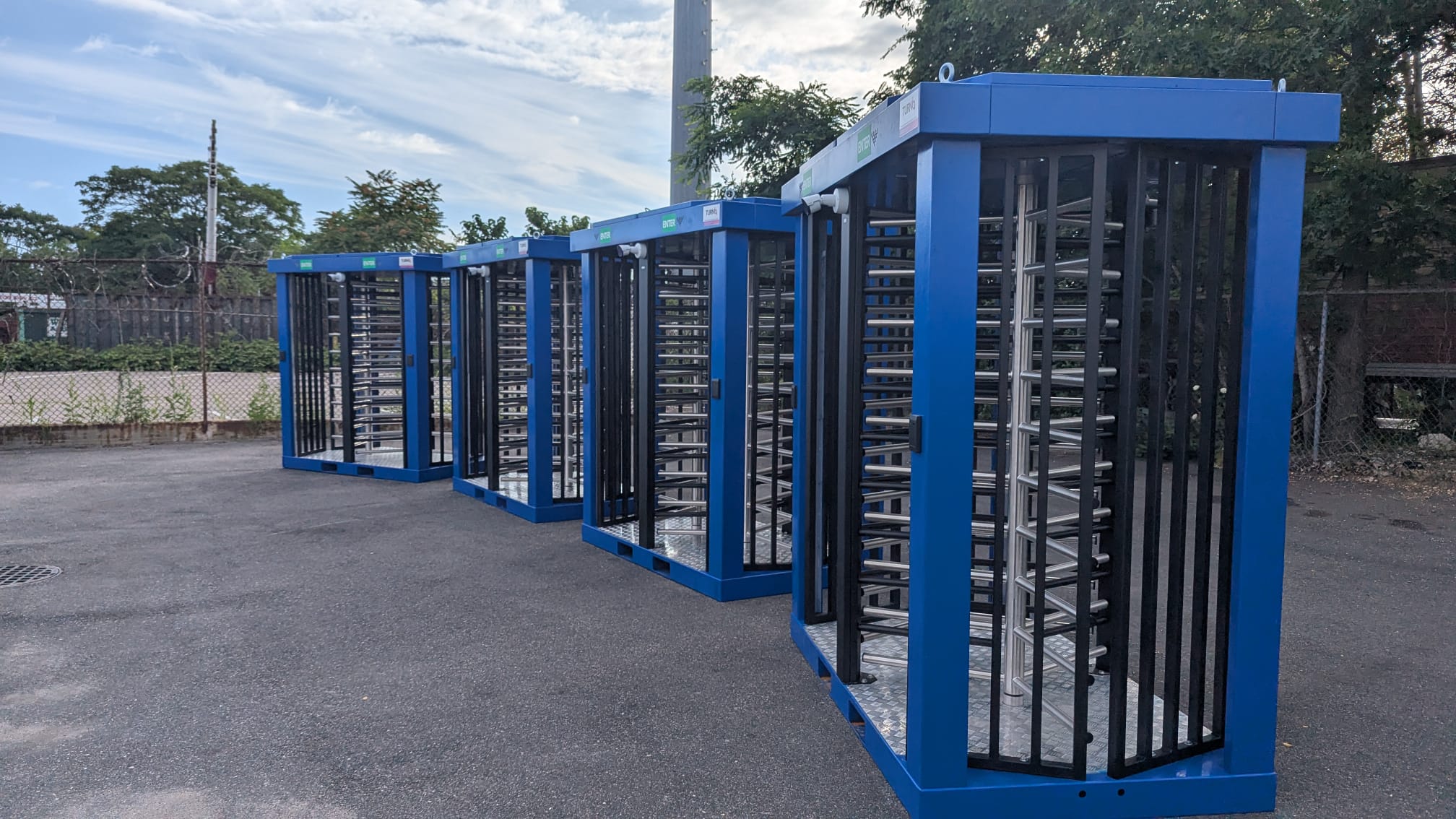 TitanX tanded lined up. Tandem full-height turnstiles lined up on a parking lot.